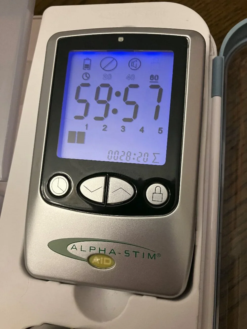 Alpha-Stim AID device kit